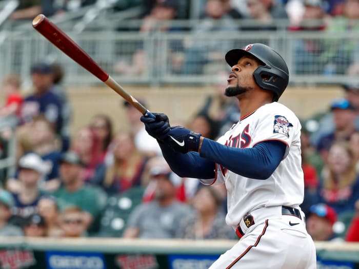 Minnesota Twins’ Byron Buxton watches a solo home run against the Chicago White Sox during the fourth inning of a baseball game Saturday, April 23, 2022, in Minneapolis. The Twins won 9-2.